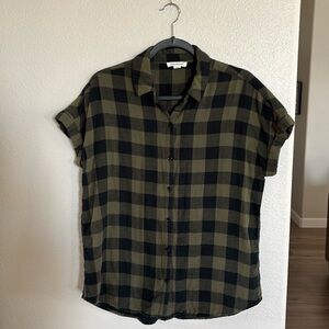 Green and black check flannel shirt sized medium.